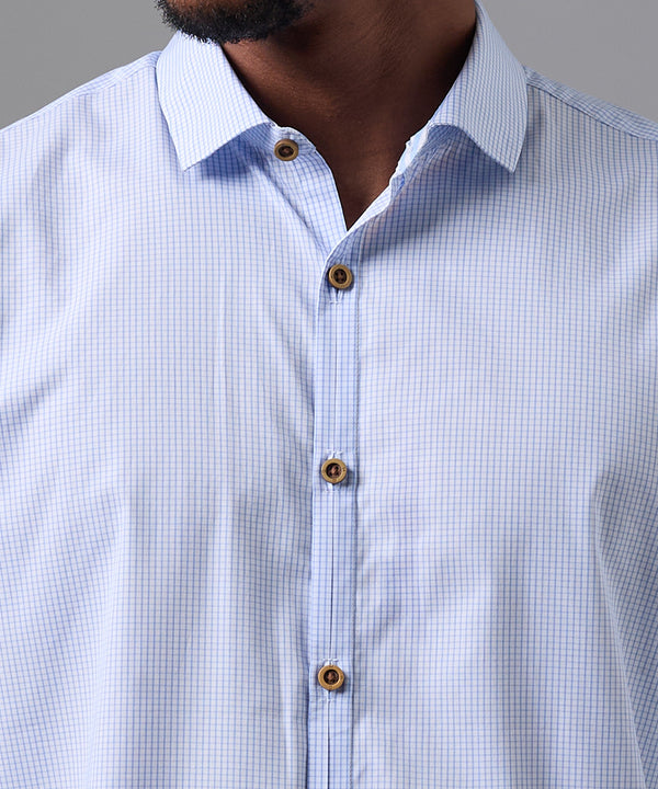 CAMISA MANGA LARGA PECHERA OJAL SLIM FIT CELESTE CUADROS OI25