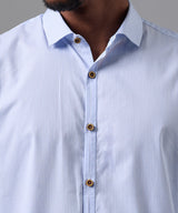 CAMISA MANGA LARGA PECHERA OJAL SLIM FIT CELESTE CUADROS OI25