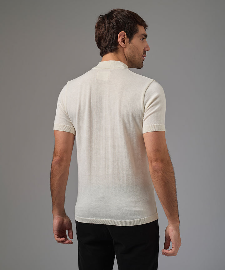POLO MANGA CORTA PET CUELLO ALTO HUESO PV26