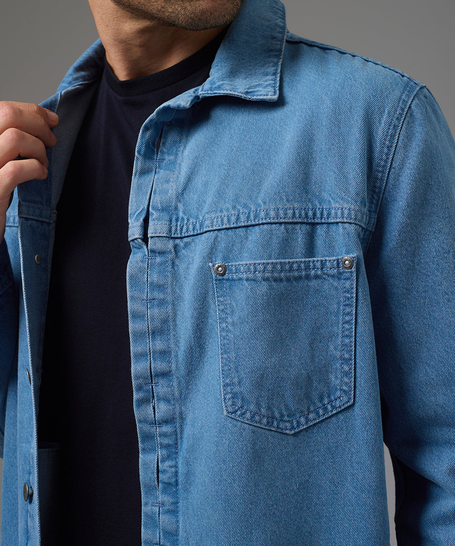 CASACA DENIM PECHERA OJAL SOBRETEÑIDO CELESTE PV26