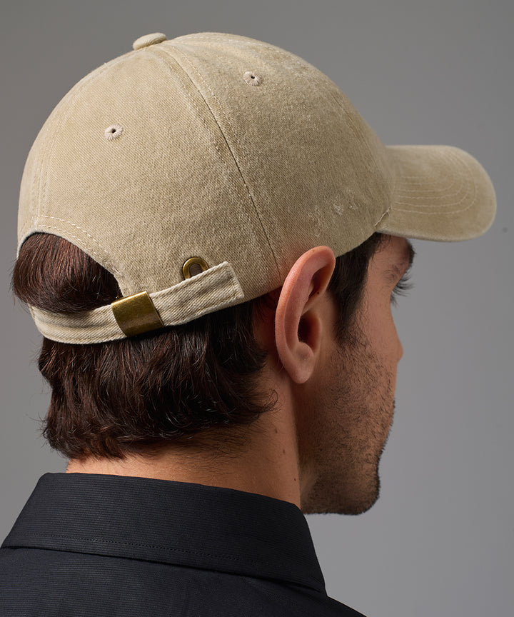 GORRA CON VISERA HUESO