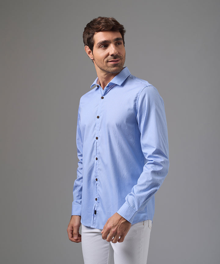 CAMISA MANGA LARGA PECHERA OJAL CLASSIC FIT CELESTE C/RAYAS PV26