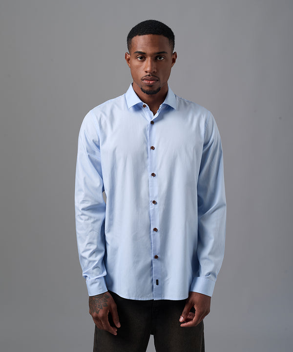 CAMISA MANGA LARGA OXFORD CUELLO SPREAD CLASSIC FIT CELESTE OI25
