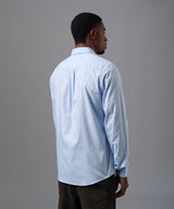 CAMISA MANGA LARGA OXFORD CUELLO SPREAD CLASSIC FIT CELESTE OI25