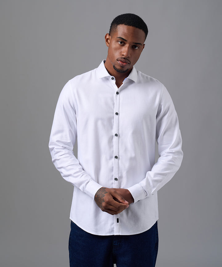 CAMISA MANGA LARGA PECHERA OJAL SLIM FIT BLANCO OI25