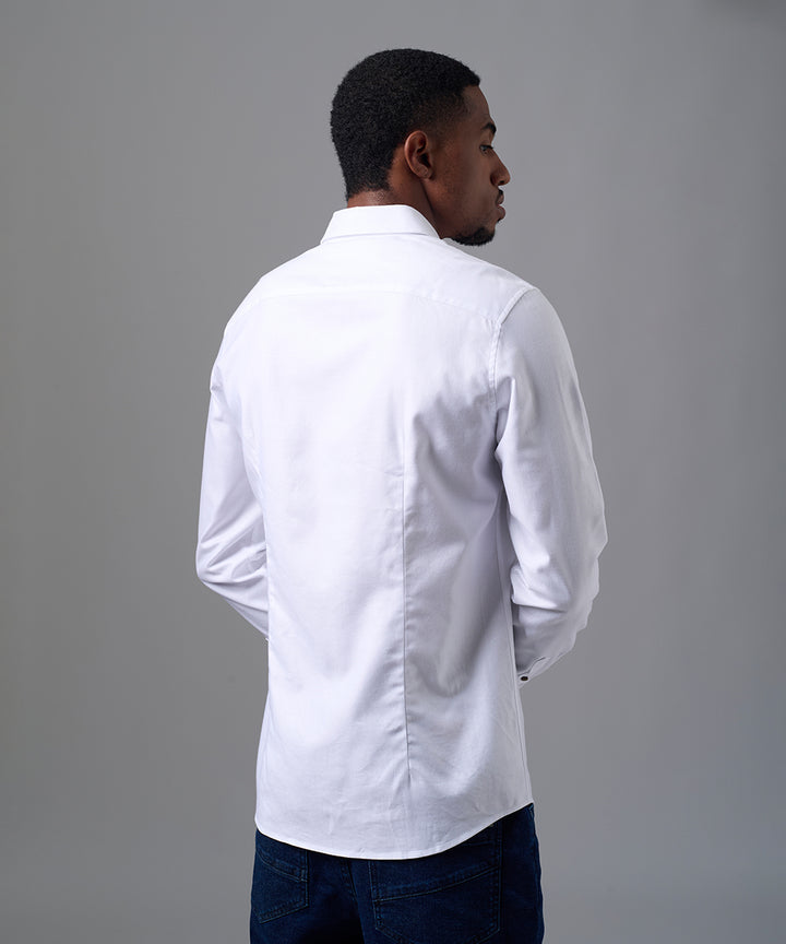 CAMISA MANGA LARGA PECHERA OJAL SLIM FIT BLANCO OI25