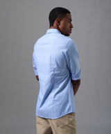 CAMISA MANGA LARGA PECHERA OJAL SLIM FIT CELESTE OI25