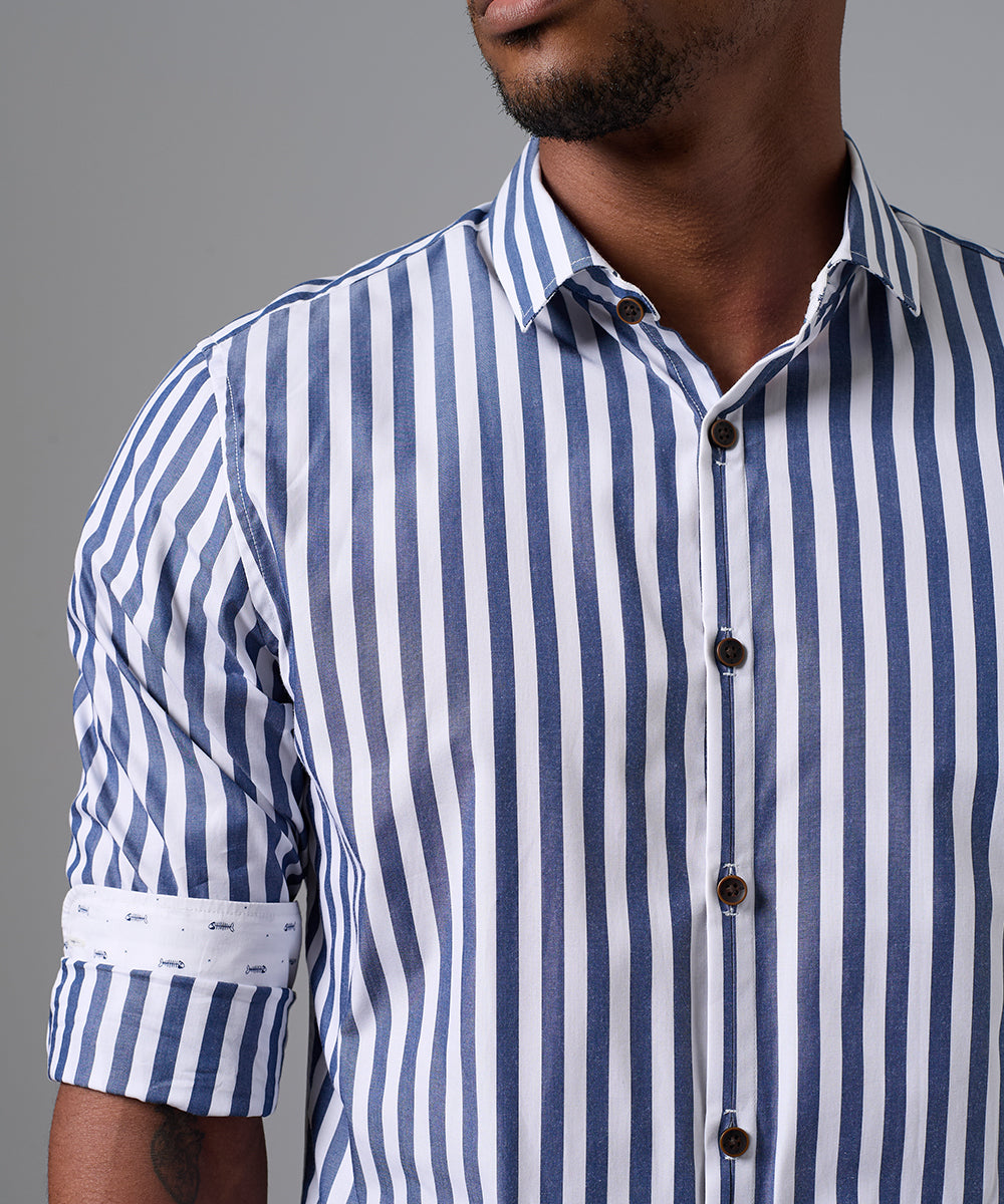 CAMISA MANGA LARGA PECHERA OJAL CLASSIC FIT AZUL C/RAYAS PV25