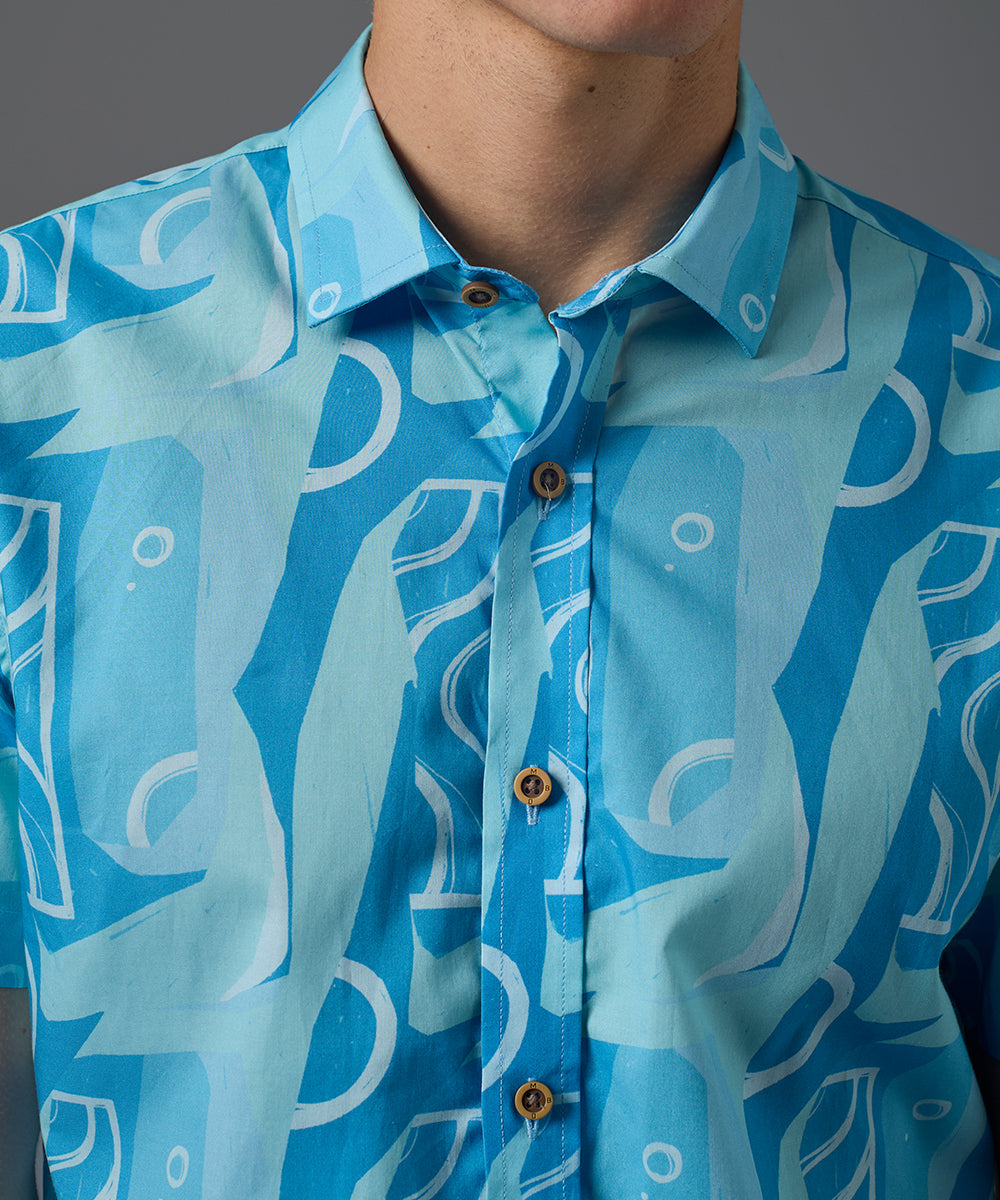 CAMISA MANGA CORTA SOMOS OCEANO SLIM FIT AZUL ESTAMPADO PV26