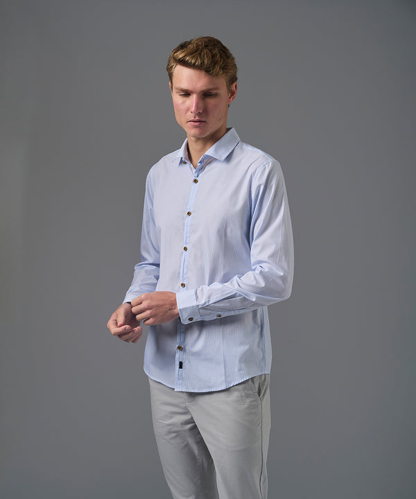 CAMISA MANGA LARGA PECHERA OJAL CLASSIC FIT CELESTE C/RAYAS PV26