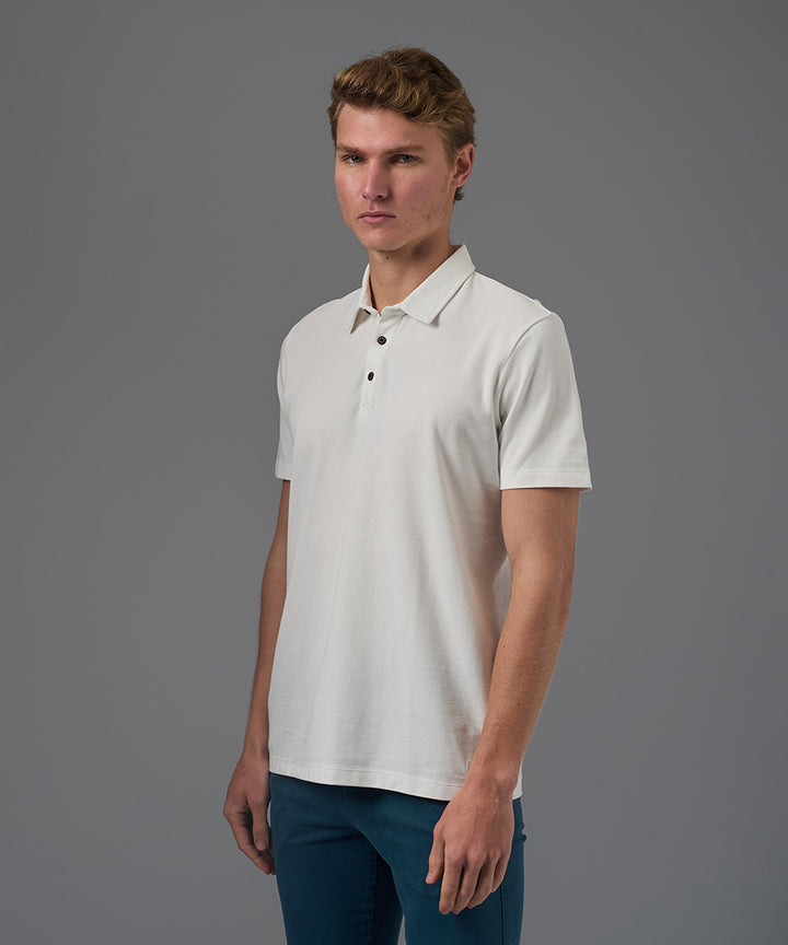 POLO MANGA CORTA PIQUE CUELLO BOX BORDADO HUESO PV26