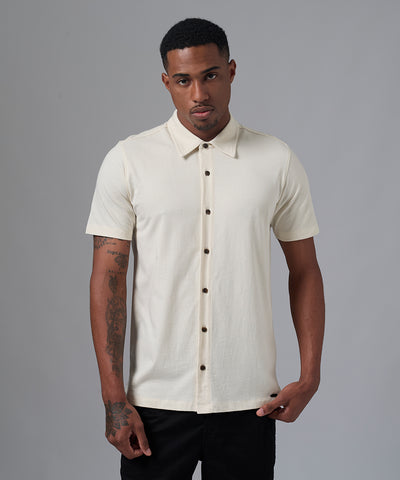 POLO MANGA CORTA JERSEY CUELLO CAMISERO HUESO PV25