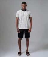 POLO MANGA CORTA CUELLO BOX ESTAMPADO CON APLICACIÓN DE TELA PLANA NEGRO PV25