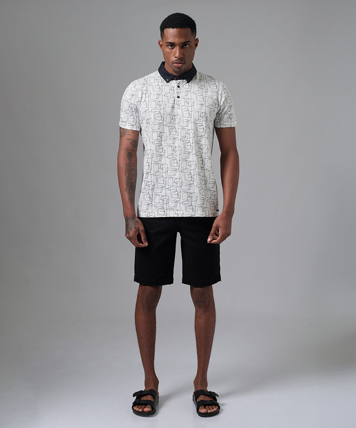 POLO MANGA CORTA CUELLO BOX ESTAMPADO CON APLICACIÇ?N DE TELA PLANA NEGRO PV25