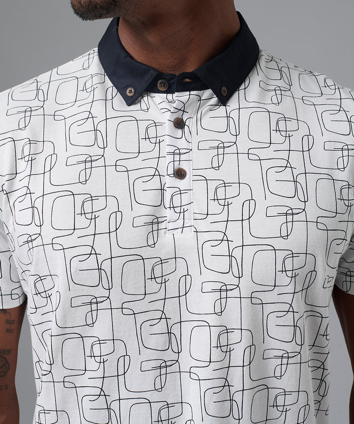 POLO MANGA CORTA CUELLO BOX ESTAMPADO CON APLICACIÇ?N DE TELA PLANA NEGRO PV25