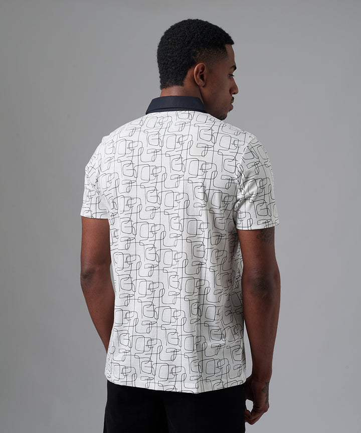 POLO MANGA CORTA CUELLO BOX ESTAMPADO CON APLICACIÇ?N DE TELA PLANA NEGRO PV25
