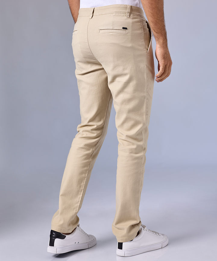 PANTALÓN BROKEN CON PLIEGUES SLIM FIT BEIGE OI24
