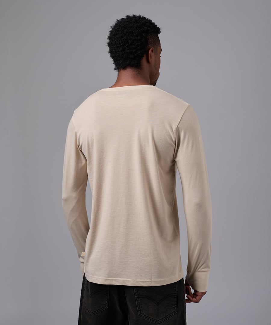 POLO MANGA LARGA JERSEY OJAL EN PUÑO BEIGE OI25