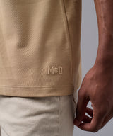 POLO MANGA CORTA PIQUE CUELLO BOX BEIGE OI25