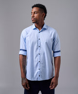 CAMISA MANGA LARGA PECHERA OJAL CLASSIC FIT CELESTE OI25