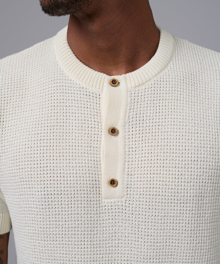 POLO MANGA CORTA TEJIDO PET CUELLO NERU HUESO OI25