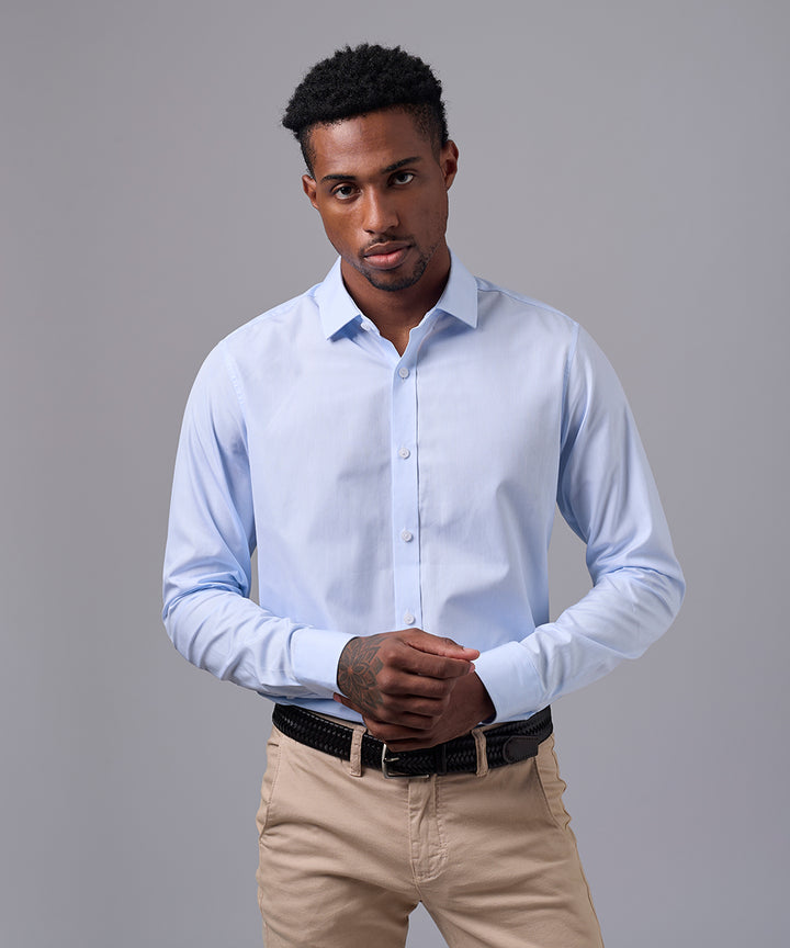 CAMISA MANGA LARGA DE VESTIR CUELLO SPREAD CELESTE C/RAYAS OI25