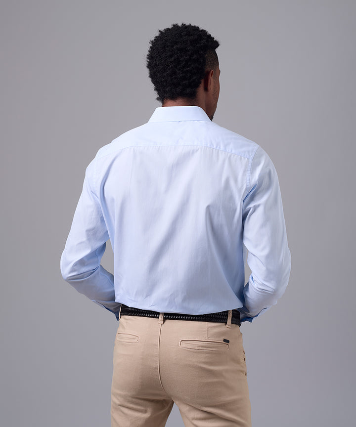 CAMISA MANGA LARGA DE VESTIR CUELLO SPREAD CELESTE C/RAYAS OI25