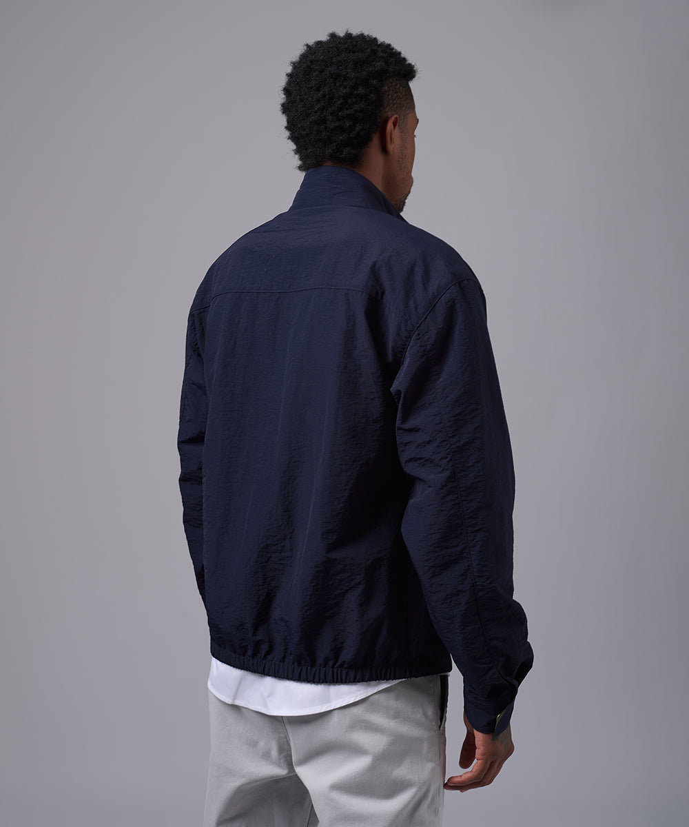 CASACA IMPERMEABLE REVERSIBLE AZUL MARINO OI25