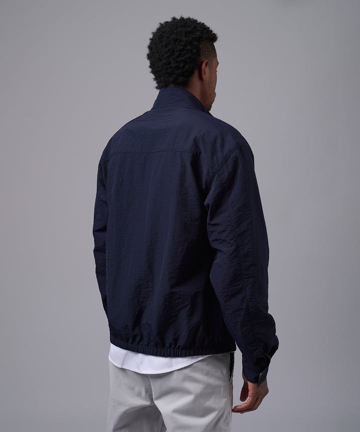 CASACA IMPERMEABLE REVERSIBLE AZUL MARINO OI25
