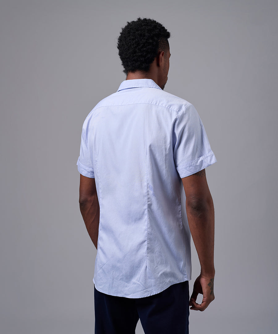 CAMISA MANGA CORTA CASUAL BOLSILLO CON BOTON SLIM FIT CELESTE OI25